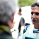A photo of former F1 driver Nelson Piquet in white racing overalls.
